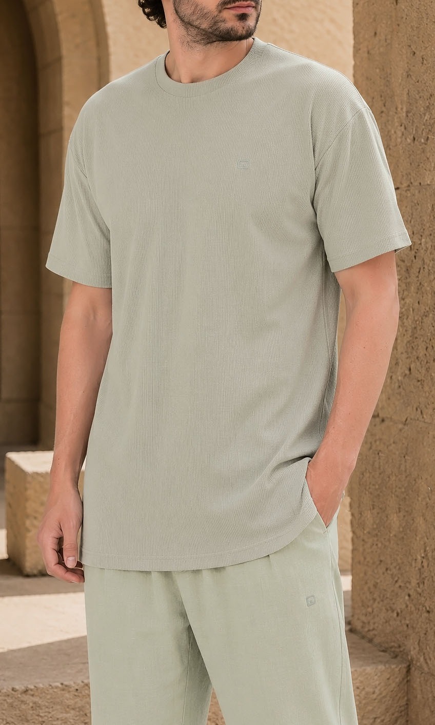 T-shirt oversized waffle vert sauge Qabail — détail texture coloris nature fraîcheur