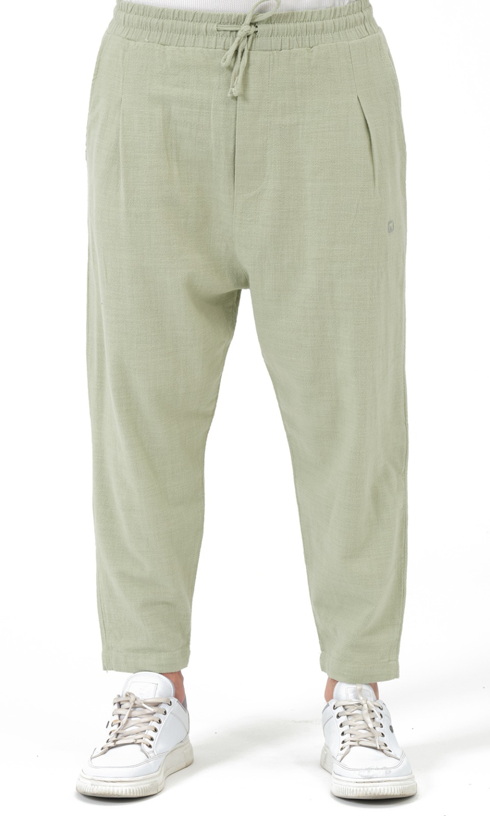 Sarouel Classik Lin vert sauge Qabail — détail cordons finition ourlet cousue